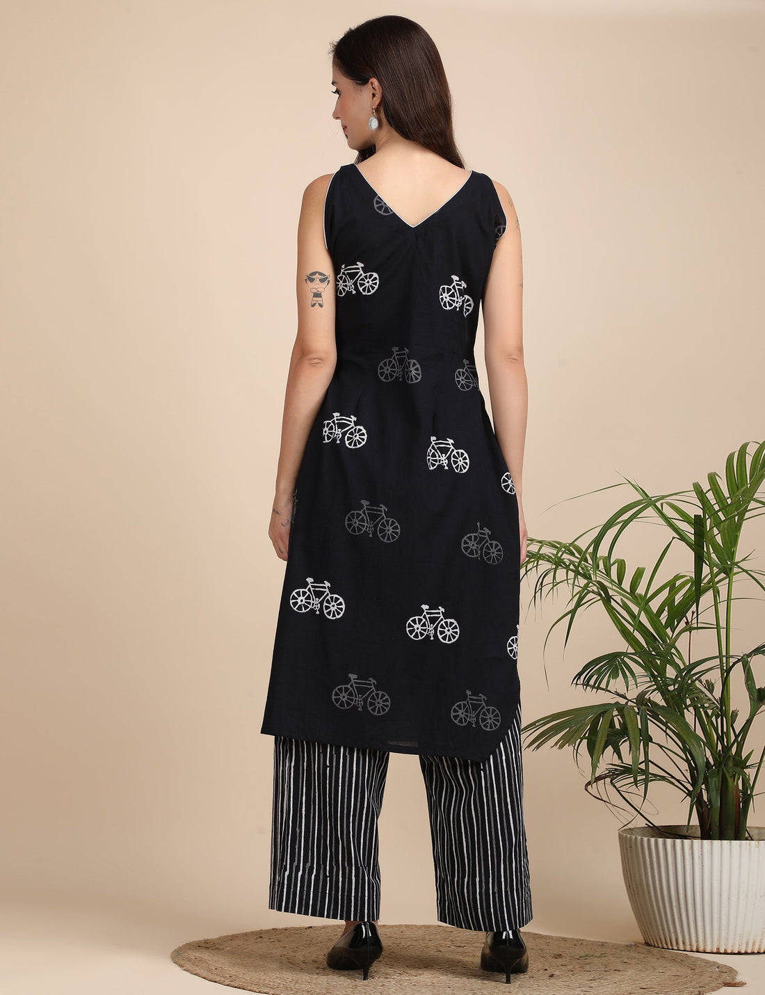 Black cycle kurta with striped pants Co-ord set